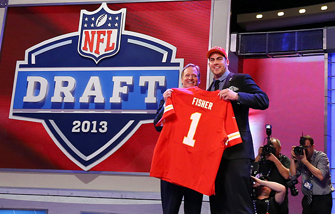 The NFL couldn't care less which conference or division a kid plays in when it comes to draft day as Eric Fisher (#1 overall last year)  and Khalil Mach (#4 overall this year) both from the Mid-American Conference, taught us. (Photo Credit - Al Bello, Getty Images)